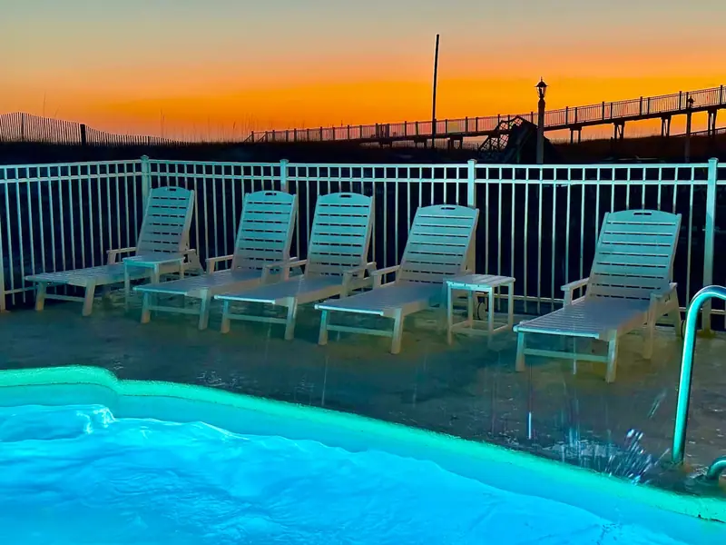The pool at dusk, Beachfront Duplex