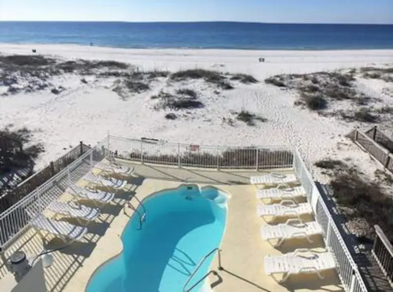 Dolphin View's beachside pool and the beach